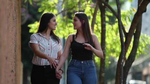 Lesbian Girlfriends Walking City Sidewalk Outdoors Two Young Women Holding — Stock video