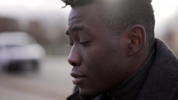 Pensive Concerned Black African Man Sitting City Sidewalk Curb Feeling — Video