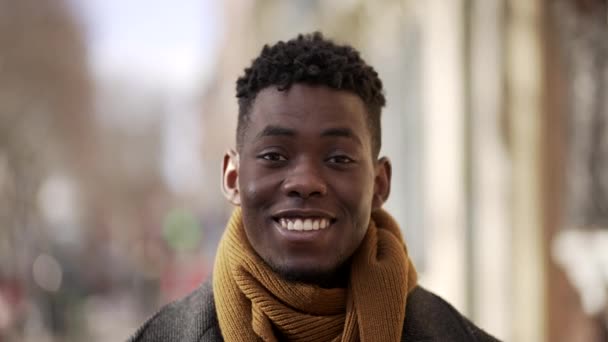 Portrait Black African Male Smiling Camera Wearing Scarf City — Video Stock