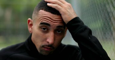 Hispanic man walking forward, south american latin guy serious face