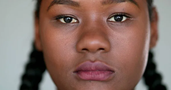 African girl smile close-up face. Black ethnicity female macro closeup