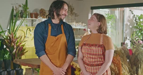 Happy Employees Standing Flower Store Smiling Camera Two Male Female — Wideo stockowe