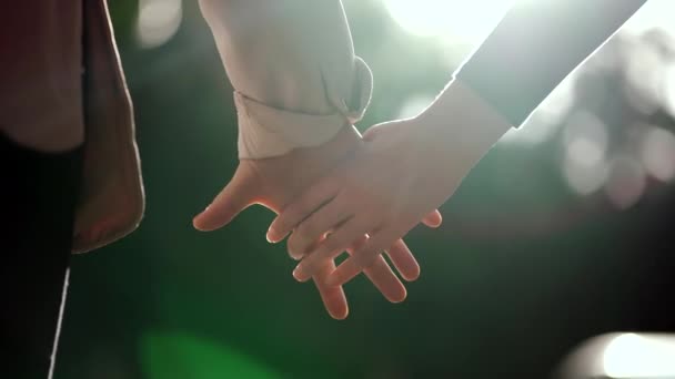 Two People Joining Hands Sun Flare Background Closeup Girlfriends Joined — Stock video