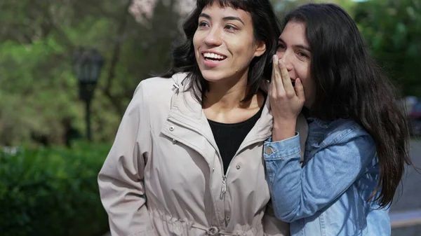 Two Female Friends Gossiping While Walking Street Young Women Conversation — Zdjęcie stockowe
