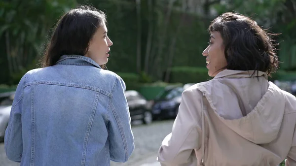 Two Young Female Friends Walking Street Back Women Talking Chatting — Foto de Stock