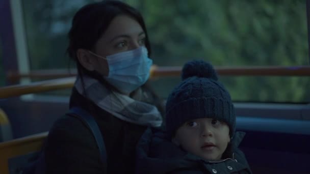 Mother Riding Bus Baby Infant Lap Covid Face Mask — Vídeo de Stock