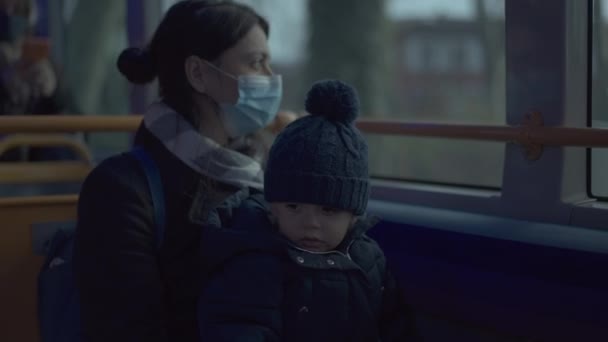 Mother Wearing Covid Face Mask Toddler Bus Public Transportation — Stockvideo