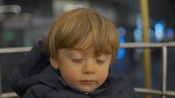 Child Boy Waiting Carousel Start Sitting Patiently — Vídeos de Stock