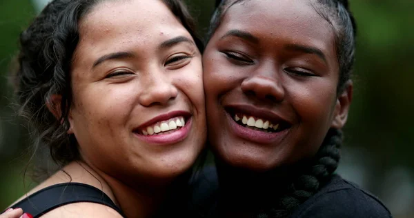Two Interracial Girlfriends Hugging Each Other Close Interracial Faces Embrace — Stockfoto