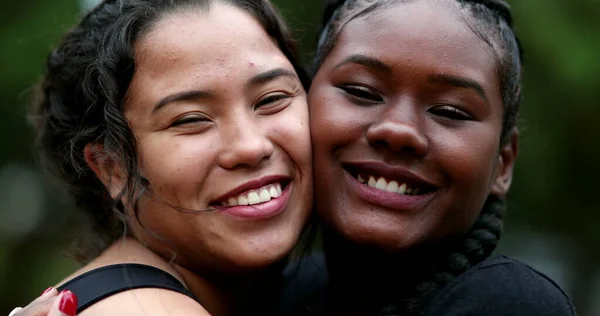 Two Interracial Girlfriends Hugging Each Other Close Interracial Faces Embrace — Fotografia de Stock