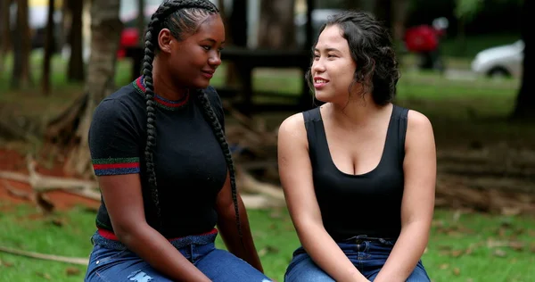 Two Friends Real Life Laugh Smile Together Outdoors Hispanic African — Zdjęcie stockowe