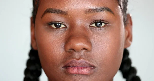 Serious Black African Girl Staring Camera Extreme Close Face — Stockfoto