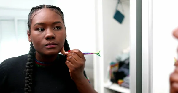 Young Black Woman Applying Make Front Mirror Casual African Mixed — стоковое фото