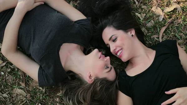 Girlfriends Lay Field Daydreaming Looking Each Other Smiling — Stock Photo, Image