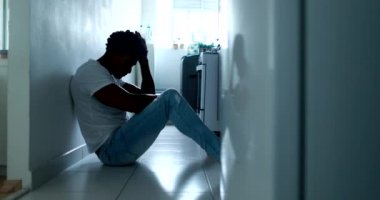 Man emotional breakdown feeling depressed on floor broken, person feeling worry and preoccupation
