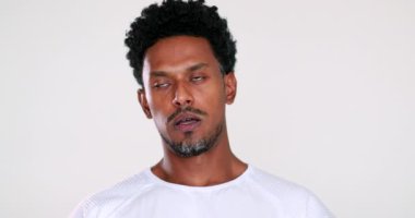 African American feeling stressed emotion, black man taking deep breath feeling anxiety and boredom