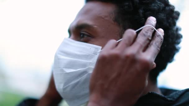 African Black Man Removing Surgical Epidemic Mask Smiling Camera Portrait — стоковое видео