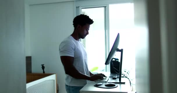 Person Working Home Standing Desk Black African American Looking Monitor — Stock video