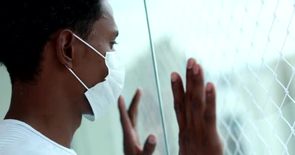 African American Man Quarantine Wearing Covid Virus Mask Indoors Leaning — Vídeo de Stock