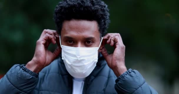 Portrait Black African American Putting Face Mask Outdoors — Αρχείο Βίντεο