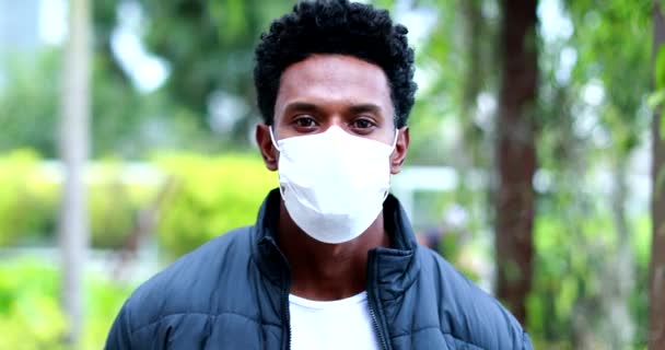 African American Man Wearing Virus Mask Walking Forward Camera — Stok video