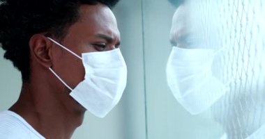 Young black person wearing coronavirus face mask