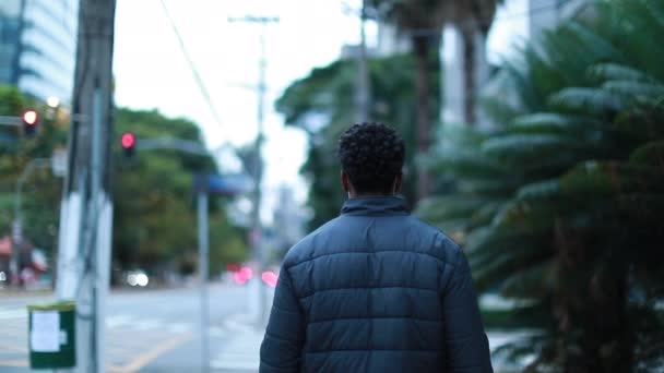Black Man Walking City Sidewalk Night — Stockvideo