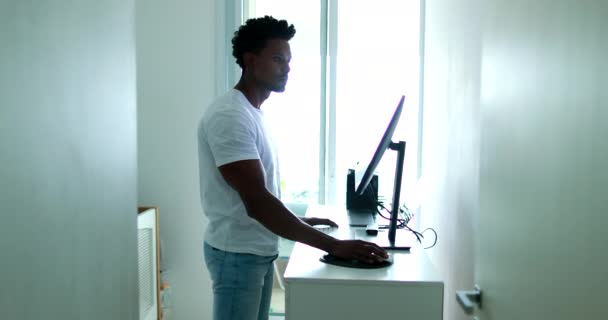 Man Working Home Office Looking Monitor Standing Desk — Wideo stockowe