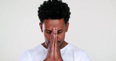 Spiritual African man portrait smiling worshiping with faith and hope