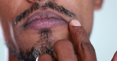 African man touching mouth nose face thinking, dont touch your face during pandemic concept