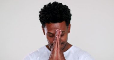 Mixed race diverse man feeling grateful and thankful