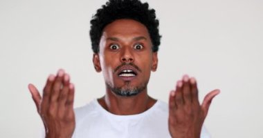 Portrait unhappy displeased African man squeezing neck with hands, choking, under pressure, no money, strangle neck