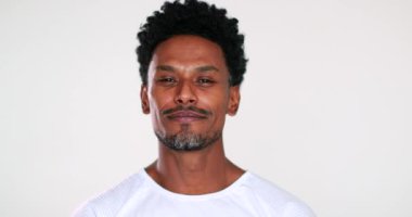 Smiling Black guy portrait looking to camera, handsome charismatic person