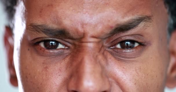 Worried African Man Closeup Eyes Squinting Concerned Preoccupied Black Guy — Vídeos de Stock