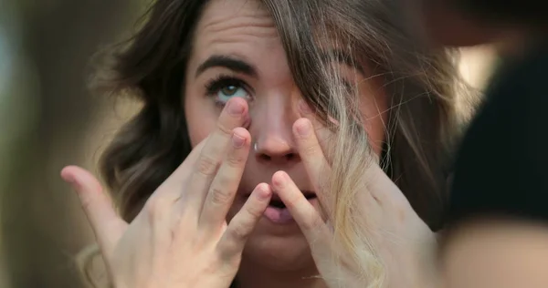 Young Woman Removing Tears — Zdjęcie stockowe