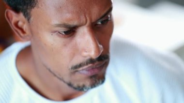 Pensive African american thinking about solution. Black man brainstorming idea