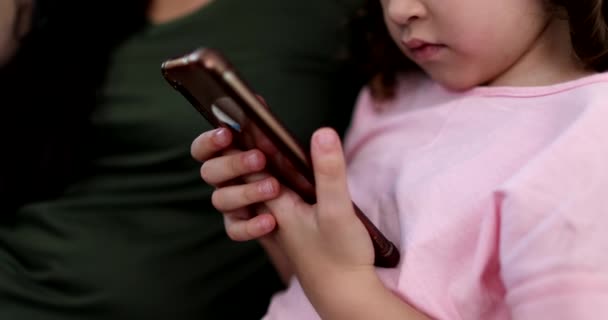 Close Little Girl Child Holding Smartphone Device — Vídeos de Stock