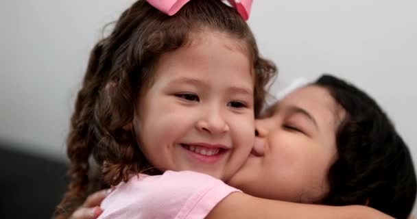 Little Girl Kissing Hugging Sibling Sister Family Love Affection — 图库视频影像