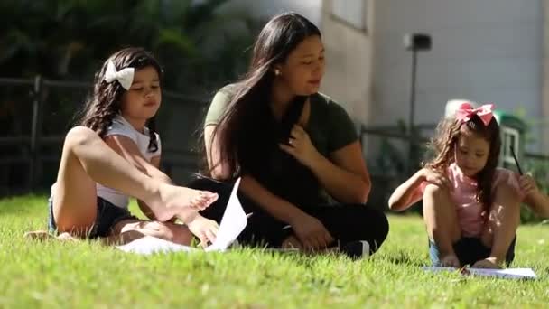 Candid Asian Mom Mixed Race Daughters Sitting — Video