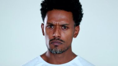 Upset Serious African man shaking head in disapproval