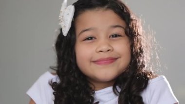 Cute mixed race little girl child portrait asian hispanic ethnicity