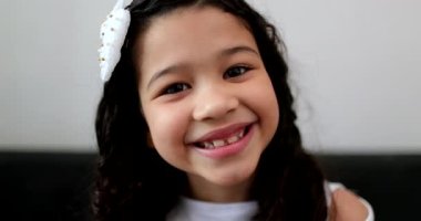 Little girl child portrait smiling, hispanic asian mix race kid, ethnically diverse global person