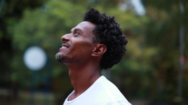 Contemplative Thoughtful Black Man Standing Smiling Feeling Spiritual — Vídeos de Stock