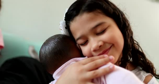Hispanic Little Girl Child Hugging Baby Black Doll Kid Kisses — Stockvideo