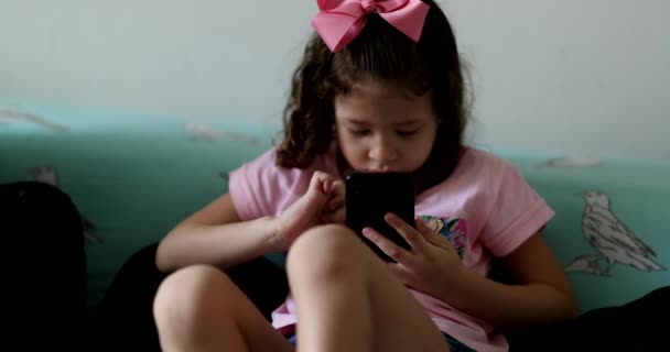 Candid Children Playing Home One Sister Cellphone Other Sibling Playing — Stockvideo