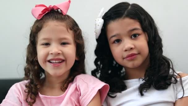 Two Little Girls Sisters Looking Camera Mixed Race Siblings Portrait — Vídeo de stock