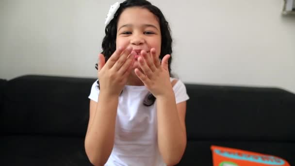 Cute Little Girl Sending Kiss Camera Hispanic Child — Stockvideo