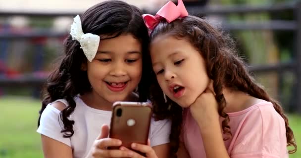 Excited Small Girls Receiving Good News Notification Children Using Smartphone — ストック動画