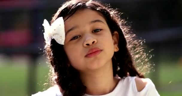 Small Girl Sending Kiss Hispanic Child Blowing Kiss — Stockvideo