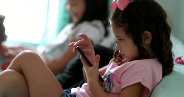 Little Girl Child Using Smartphone Device — ストック動画